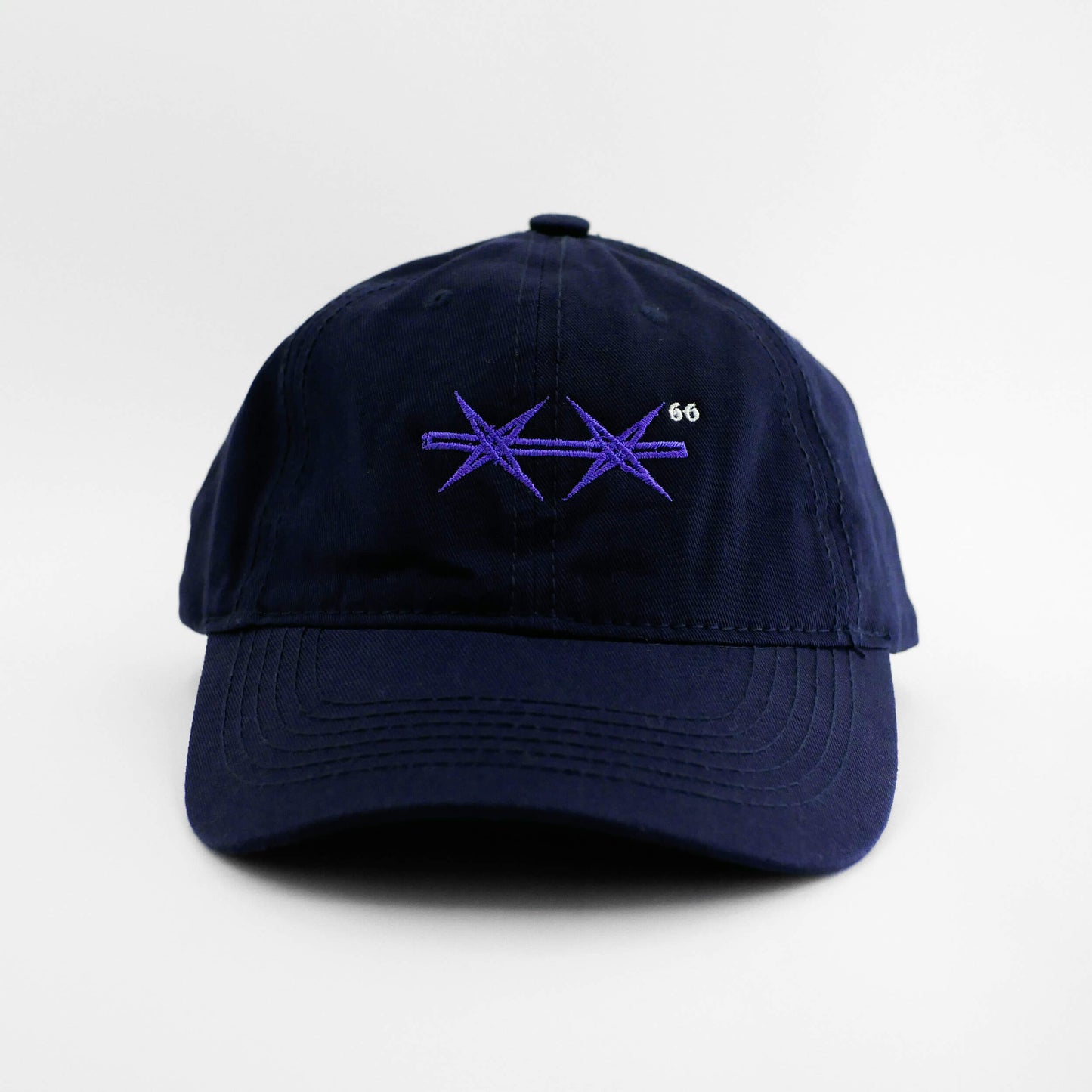 Front view of the embroidered Barbed Wire navy blue hat from PHOSIS Clothing