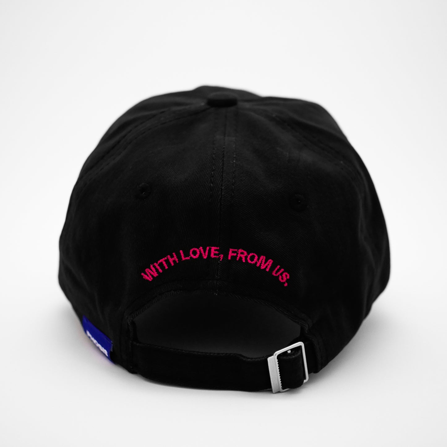 Back view of the embroidered MOB black dad hat from PHOSIS® Clothing